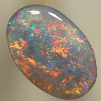 SOLID SEMI BLACK OPAL Sparkles of red/orange over green/blue